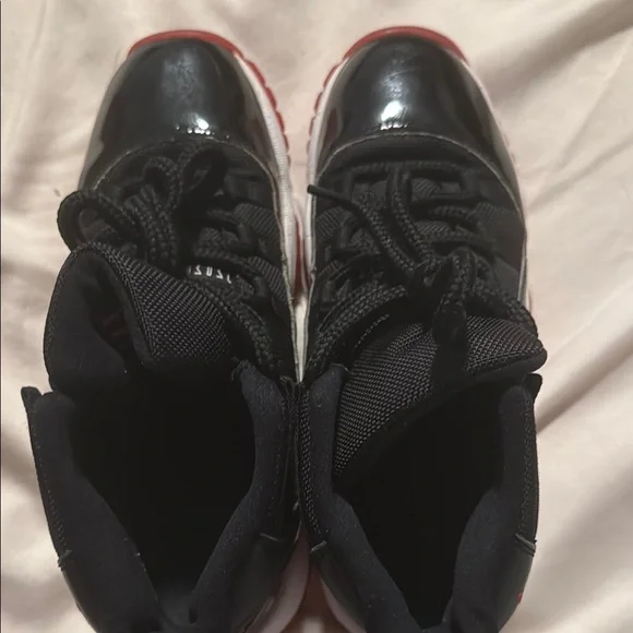Air Jordan 11 Retro Black and Red Sneakers - Picture 4 of 7